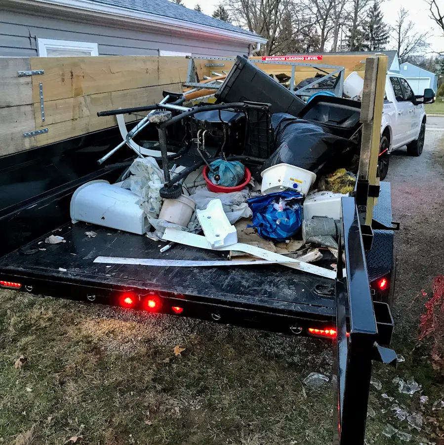 Roll-off dumpster delivered to a residential driveway in Belvedere