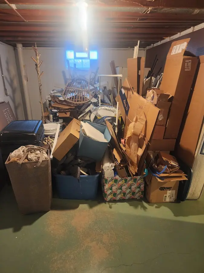 Roll-off dumpster container at job site for 2 Yard Dumpster Rental in Belvedere